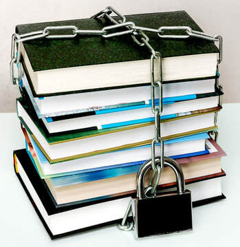 Photo illustration: books in chains and padlock